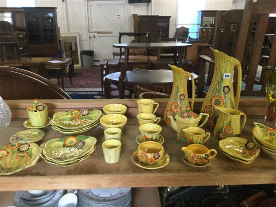 Quantity of yellow floral Carlton ware including large jugs